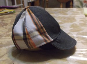 Plaid shorts and wool dress pants from Goodwill donated the necessary material for this custom fit short bill ball cap.