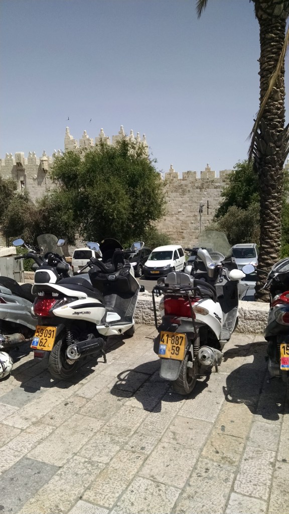 To get to the Old City, we walked through part of the Arab Quarter and then from the Damascus Gate, around the outside of the wall toward the New Gate, and entered there. One thing that was interesting is the incredible mixtures in this city. Jews, Muslims, Christians... Ancient walls and buildings next to motorbikes, sleek cars and electric trains. Interesting...