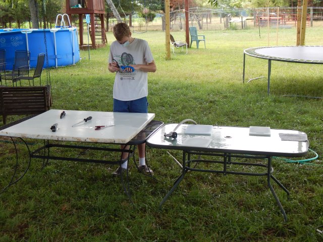 On the right is the cleaning/gutting station and then on the left is the packing station.  Coolers and ice are waiting for the birds as they come off the end.