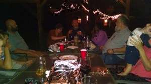 A poor pic snapped during the waning stages of our Seudat Moshiach under the Retreat Dean and Chuck recently helped me complete. Here we have Tommy and Dorothy at the far end of the table, Reynna and Tzefanyah to their left and Chris across from his youngest son, Nathaniel in the hands of off-camera wife, Mary. My two eldest sons are visible on the far left. Gunnar (i) and Jeremiah.